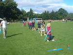 Photo of children playing cricket