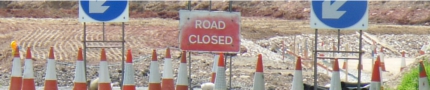 Road closure signs and cones