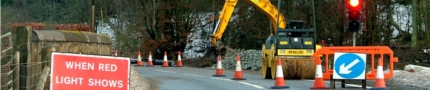 Road works digging road