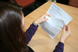 Placing the ballot paper in the envelope