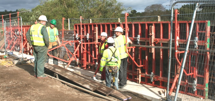 Builders working on bridge